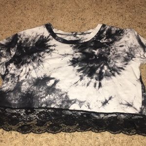 Two cropped marble tanks , one with lace @ bottom